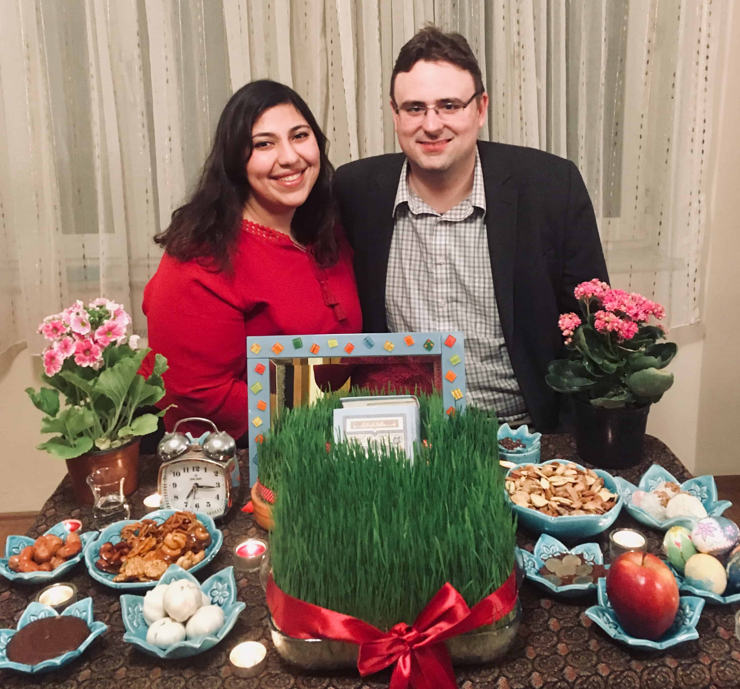 Families gather and set a table for nowruz.