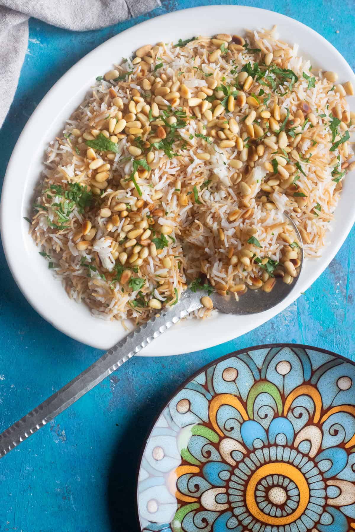 Lebanese rice and vermicelli on a white plate.