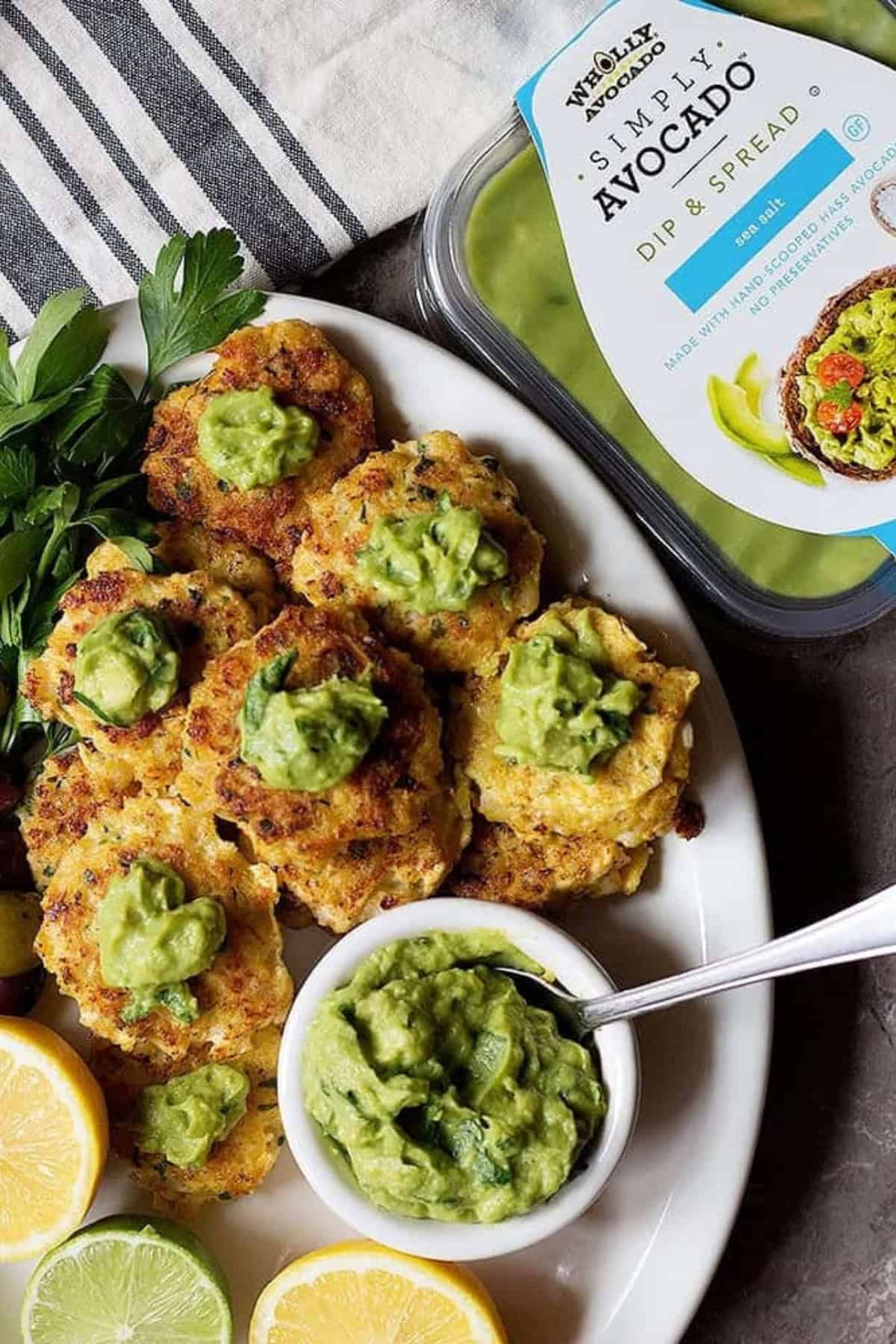 Top shrimp cakes with zesty avocado sauce. 