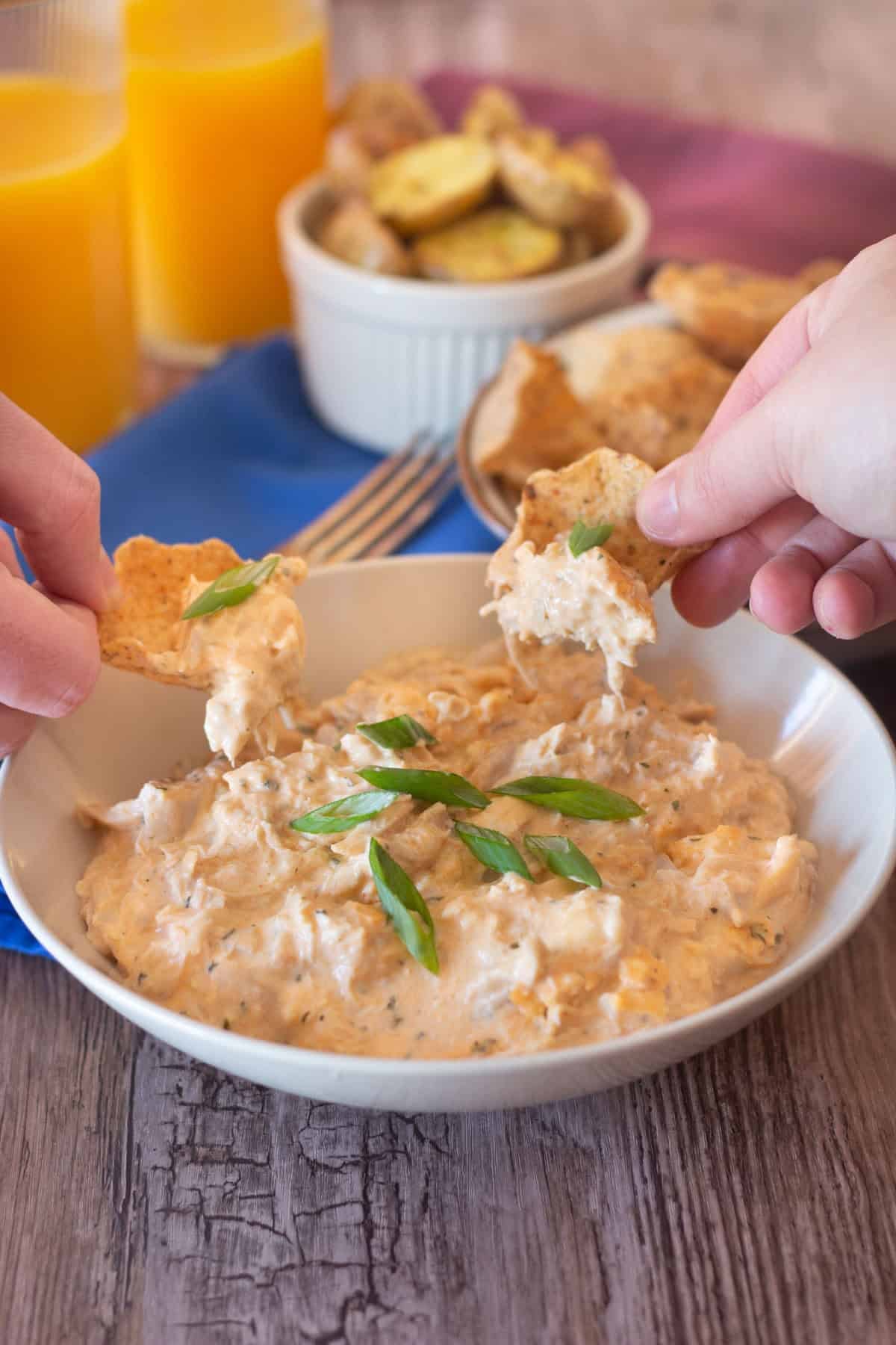 An easy buffalo chicken dip recipe made with shredded chicken and buffalo sauce. Instructions for oven, crock pot and instant pot are included.&nbsp;