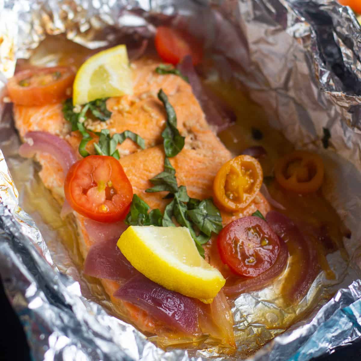 Baked salmon in foil perfect for a weeknight dinner. This easy salmon recipe is ready in 25 minutes and is so delicious!

