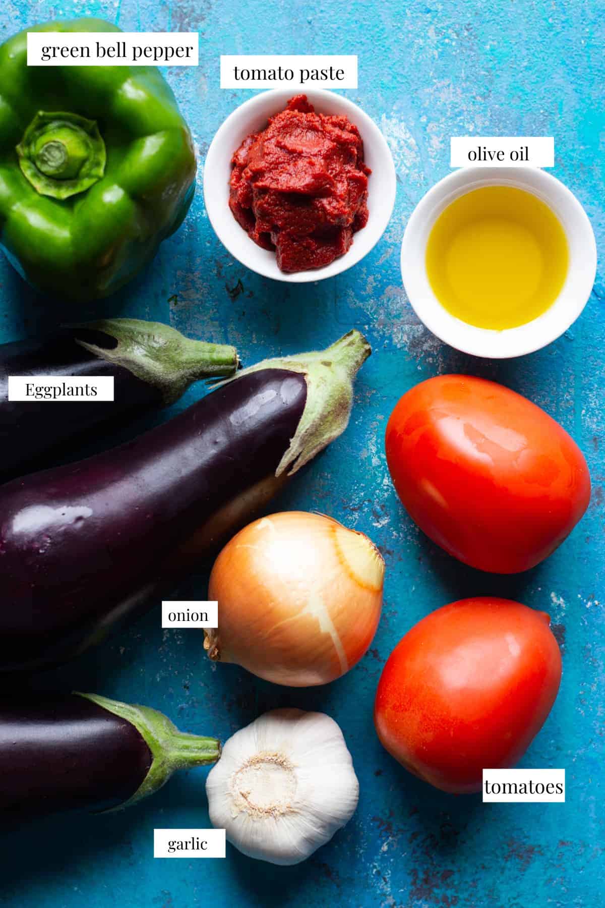 To make karniyarik you need eggplants, garlic, onion, tomatoes, pepper, olive oil and green pepper for this recipe. 