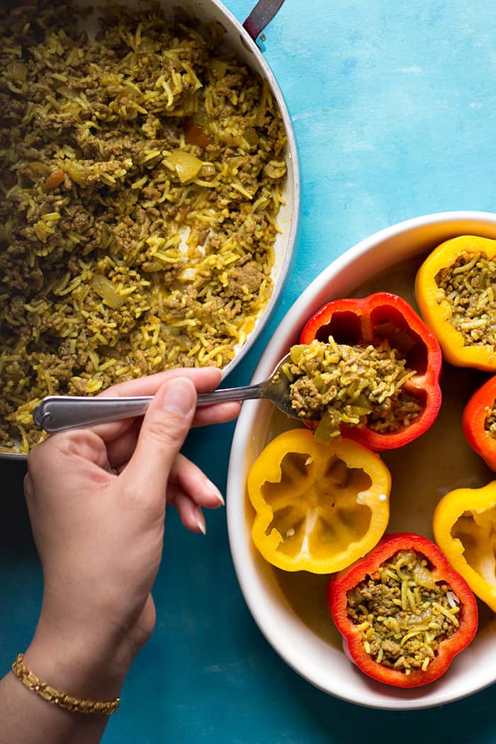 Fill the bell peppers with the rice, beef and salsa mixture and bake in the oven.