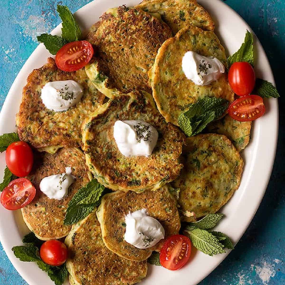 a platter of Turkish zucchini fritters for vegetarian dinner. 