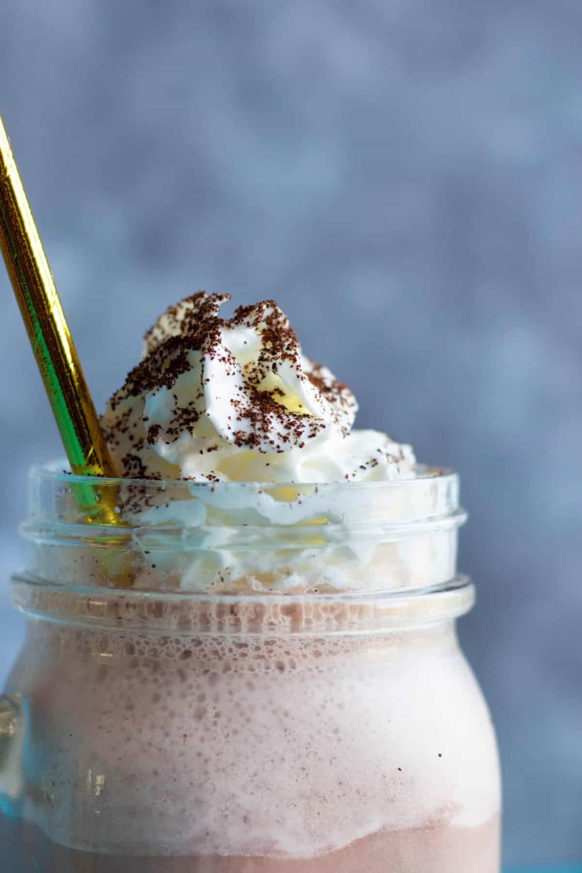 close up of a milkshake made with coffee.
