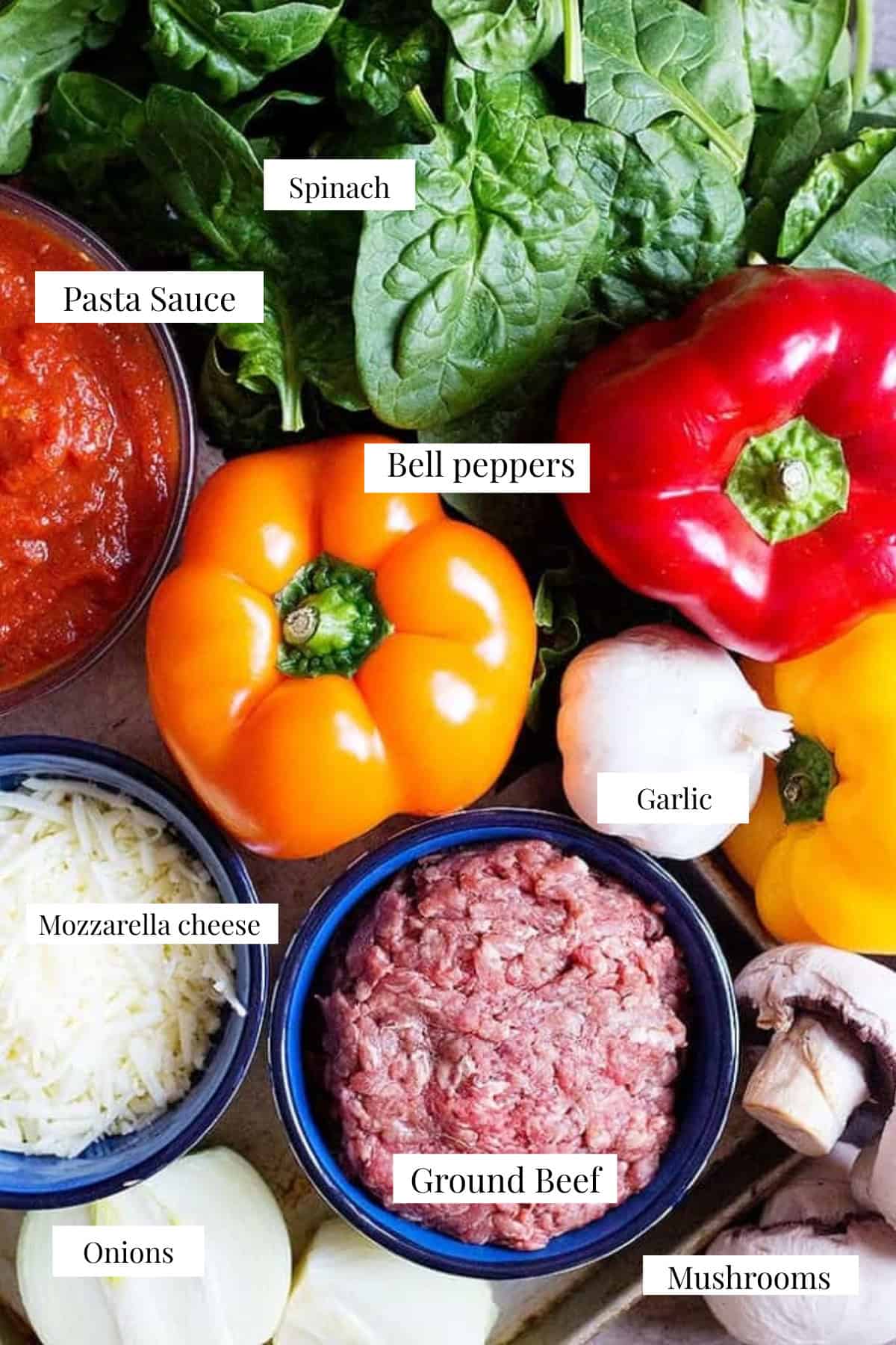 bell peppers with ground beef, spinach, mushrooms, pasta sauce, garlic and rice. 