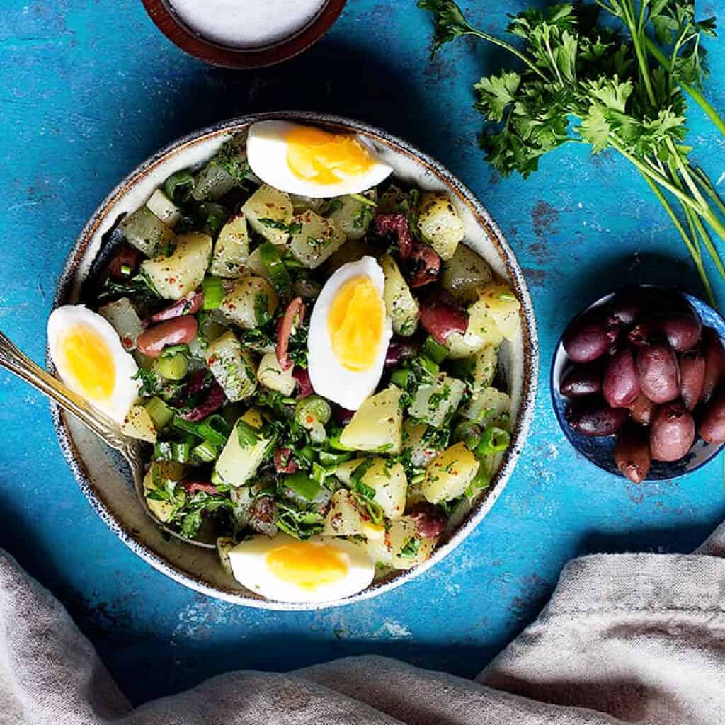 Learn how to make homemade potato salad Turkish style. This no mayo potato salad is flavored with fresh herbs and delicious spices. 

