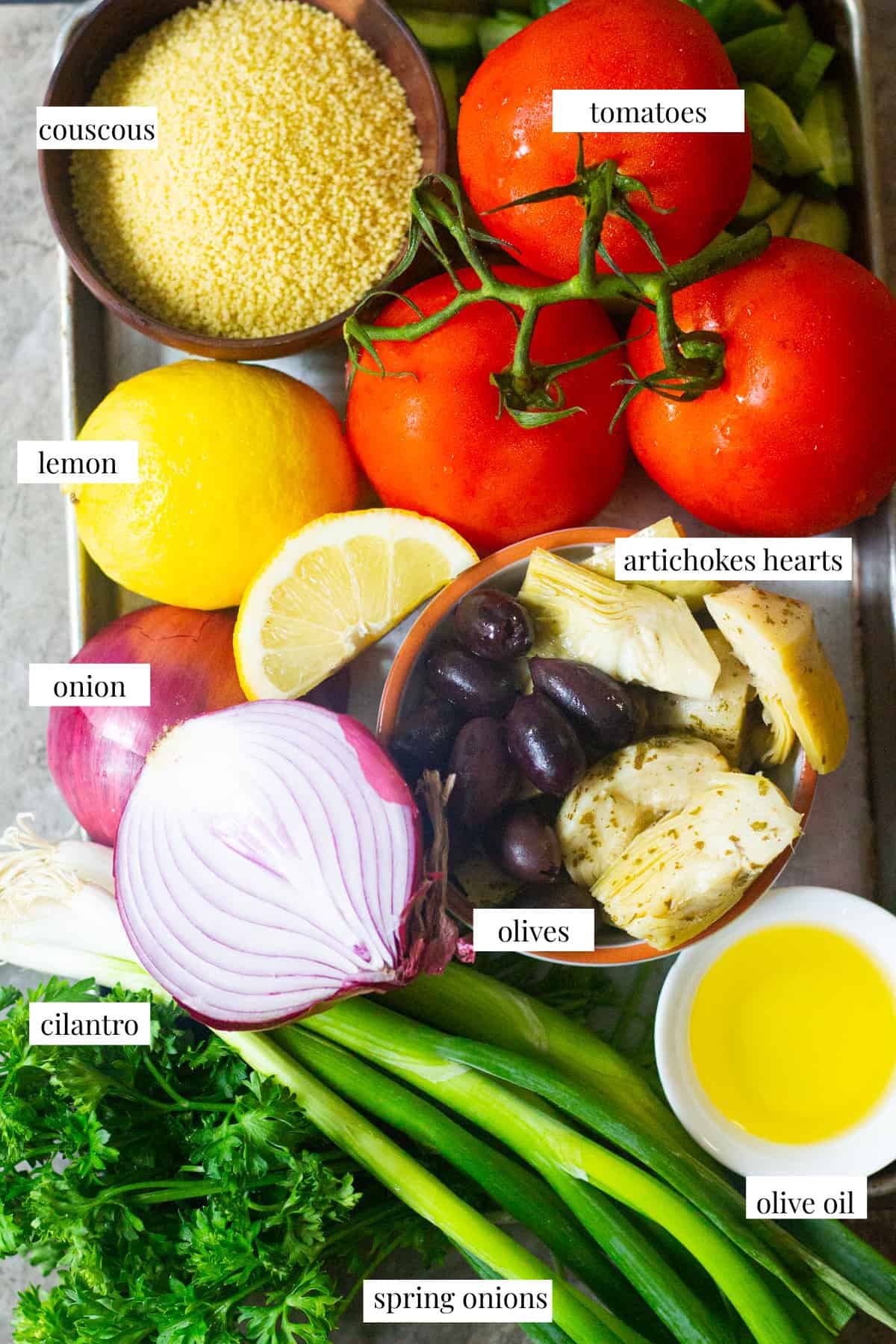 To make Mediterranean couscous salad you need couscous, onions, herbs, tomatoes, cucumbers, artichokes and olives.