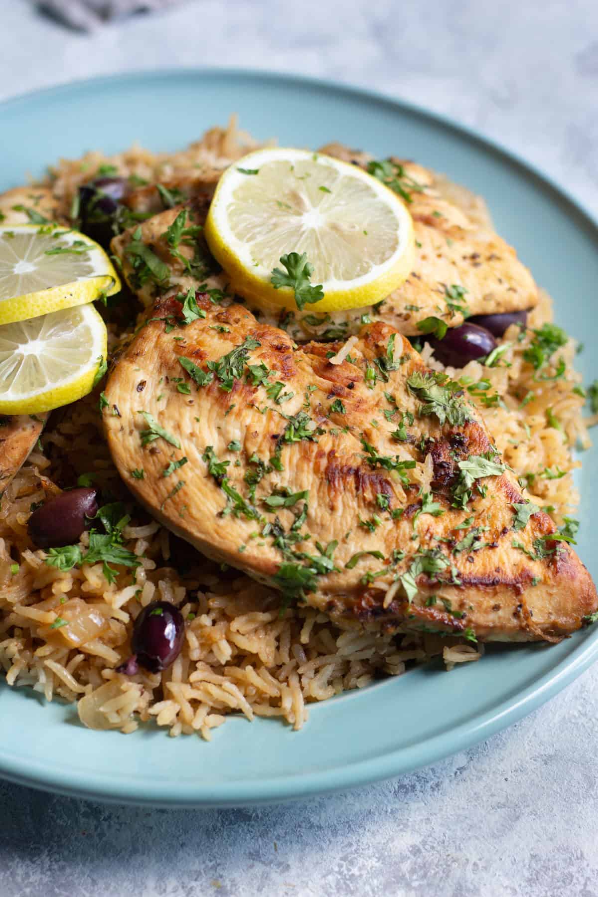 This one-pan chicken and rice is packed with delicious flavors. Read on and you'll see why this Greek chicken and rice recipe is perfect for a weeknight dinner.