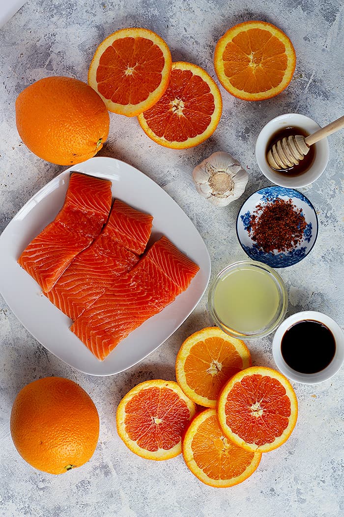 to make this recipe you need salmon, lemon juice, orange juice, honey, garlic, soy sauce and pepper. 