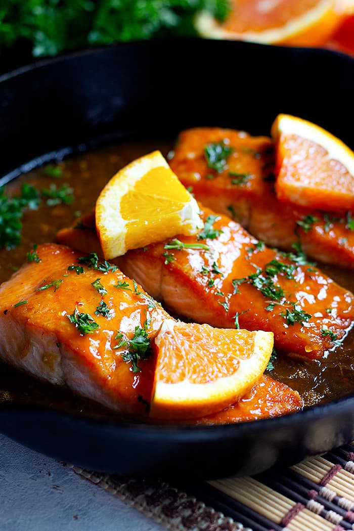 This is an easy orange glazed salmon recipe that's perfect for a weeknight dinner. Enjoy a delicious, crispy pan seared salmon cooked with a homemade orange glaze.  