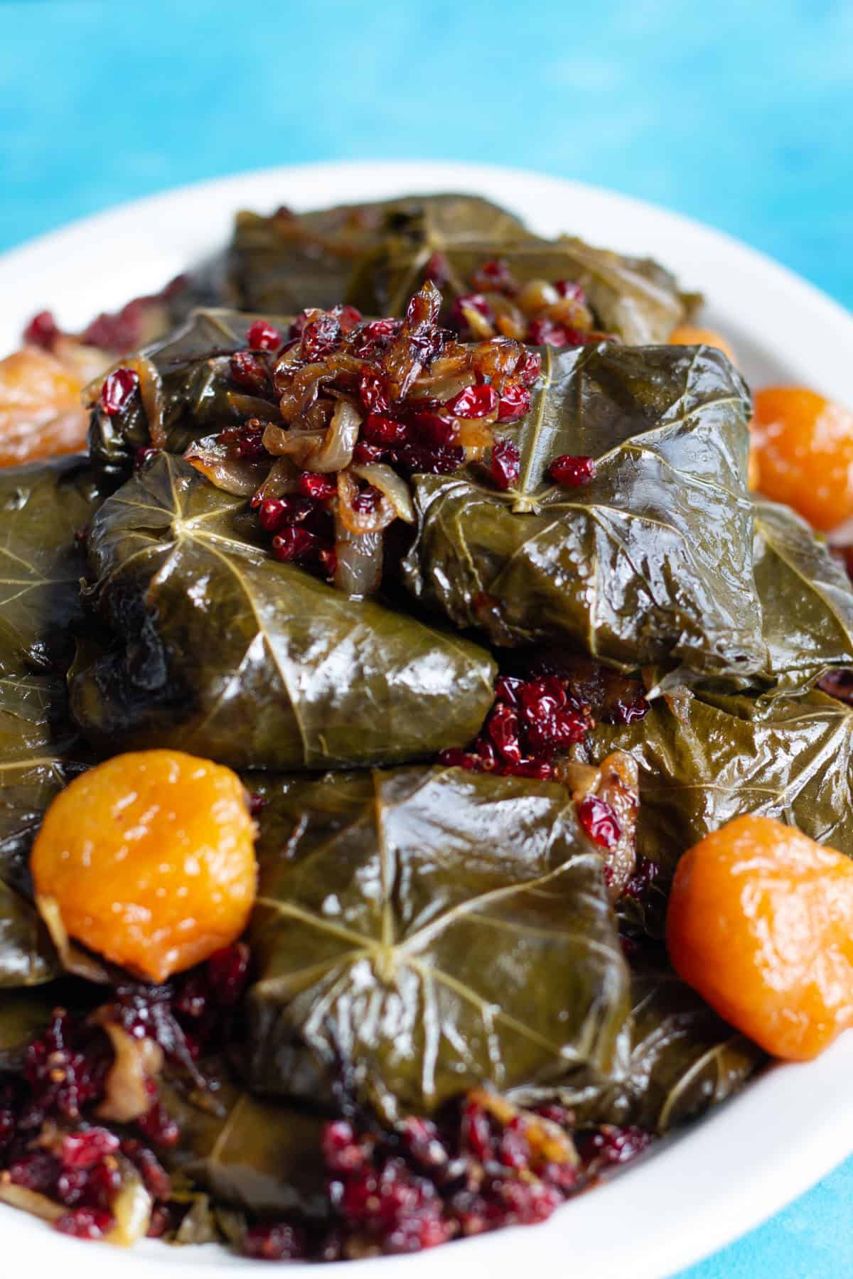Dolmeh is a traditional Persian/Iranian dish and a family favorite. This version of stuffed grape leaves is made with meat, rice and herbs.