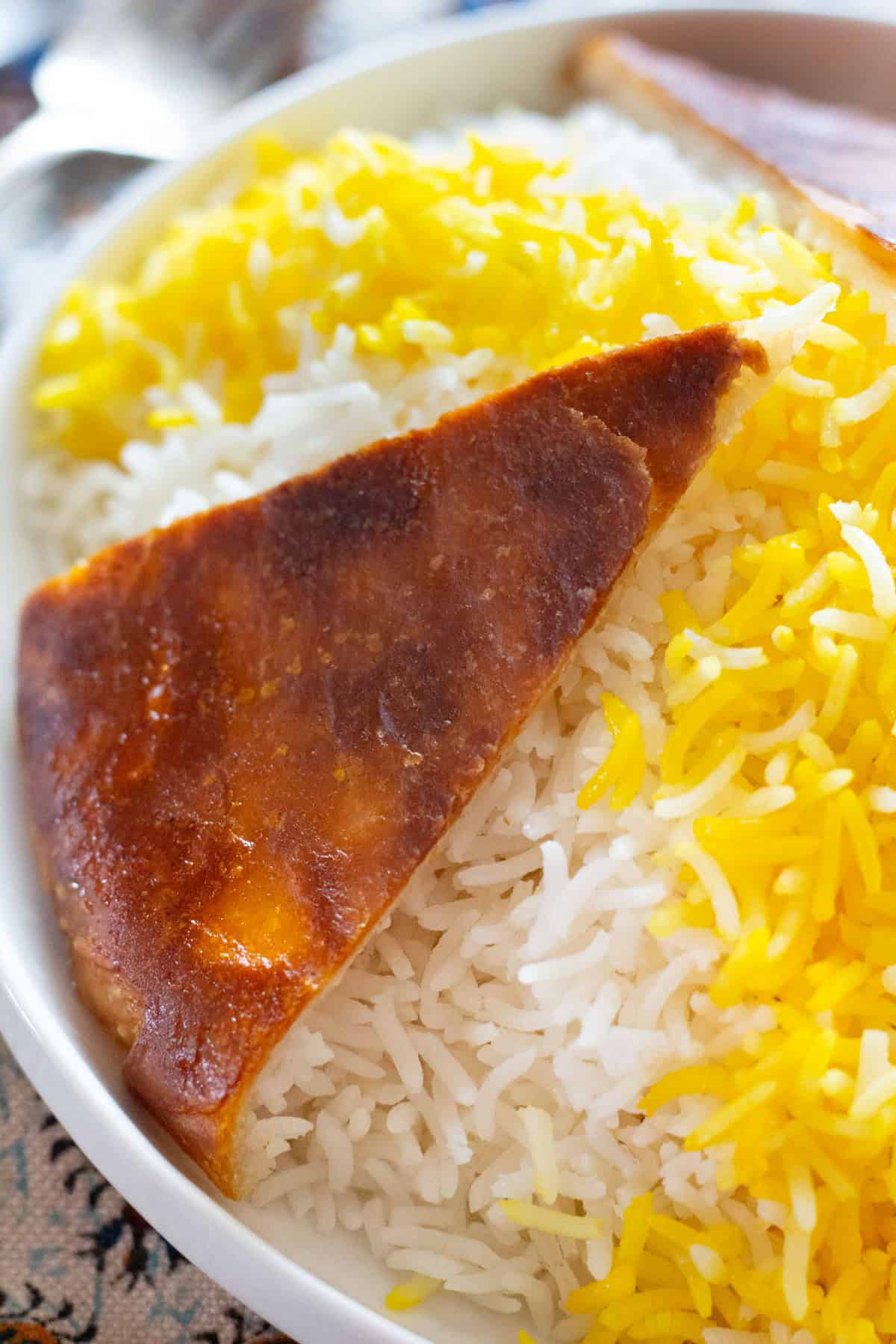 Close up shot of the rice and tahdig.