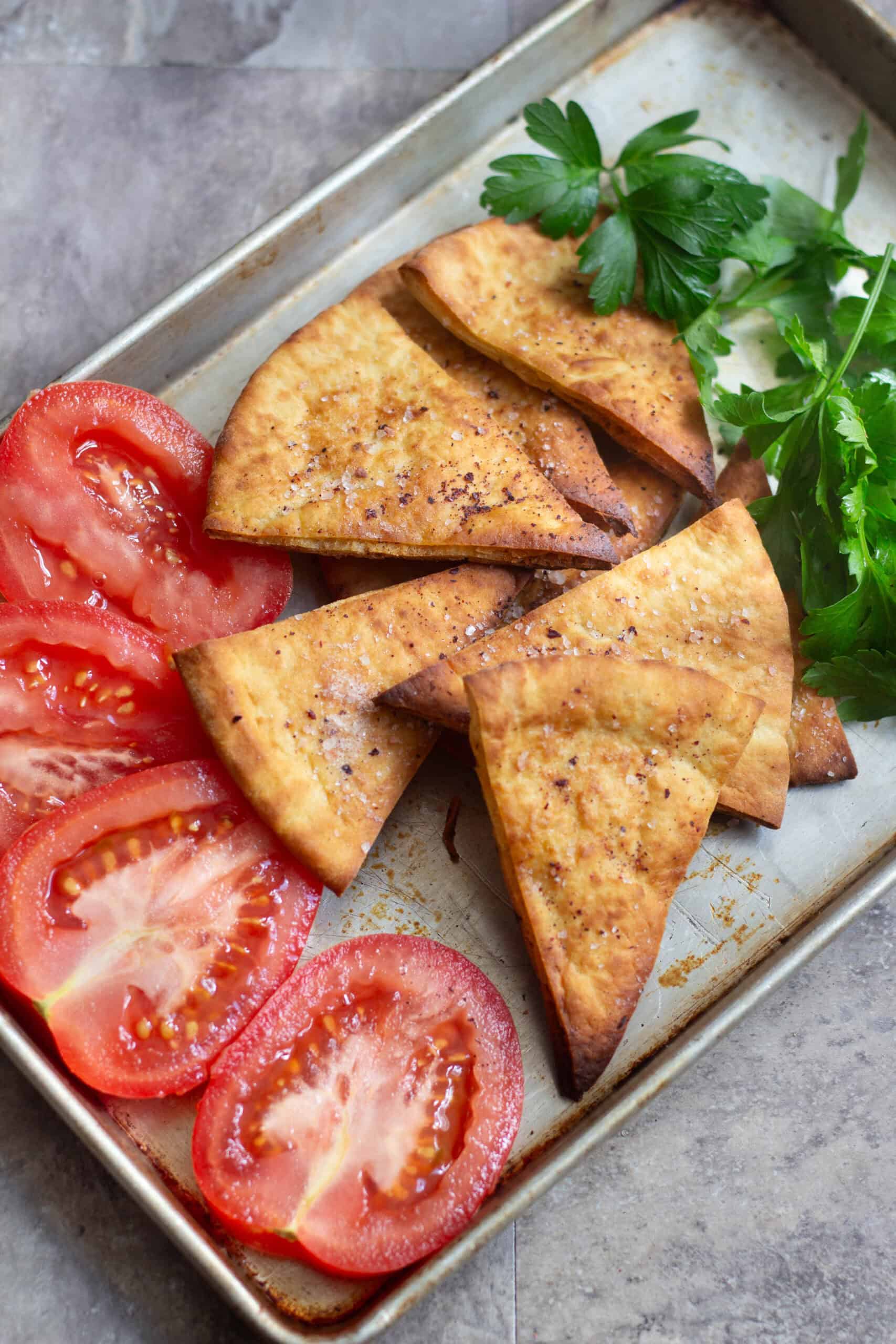 Make crispy and delicious pita chips at your home with just a few ingredients in less than twenty minutes.
