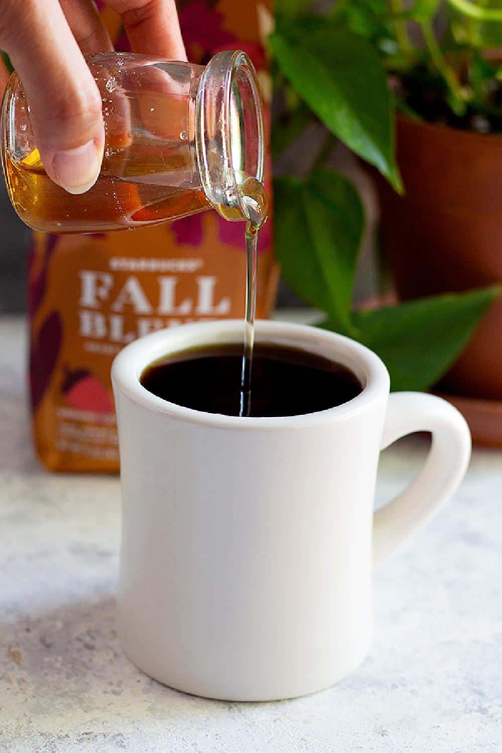 coffee syrup pouring into coffee