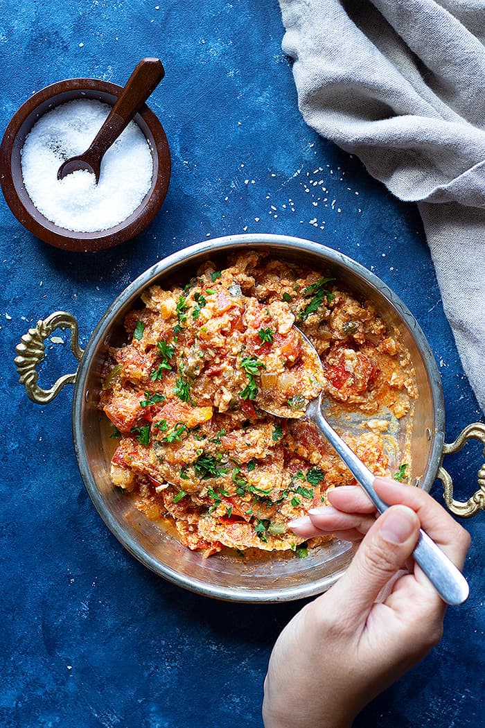 Menemen is a traditional Turkish breakfast recipe made with tomatoes and eggs. Learn how to make menemen at home with a few ingredients.  
