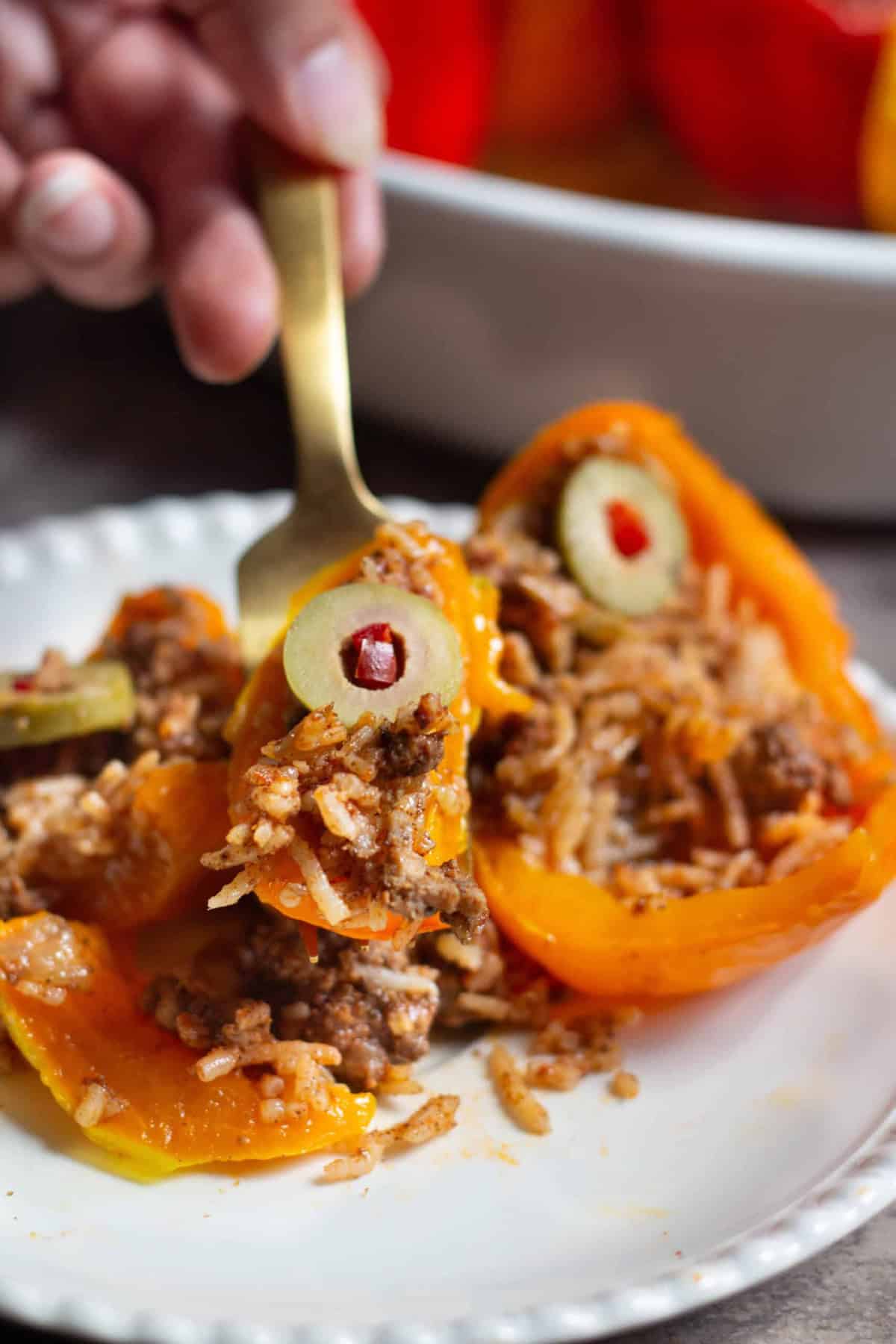 This stuffed peppers recipe is made with rice, beef and spices.