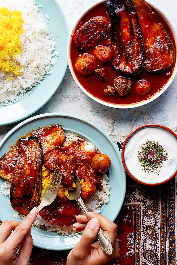 It's common to serve the stew in one bowl and rice on a plate. Side can be yogurt. 