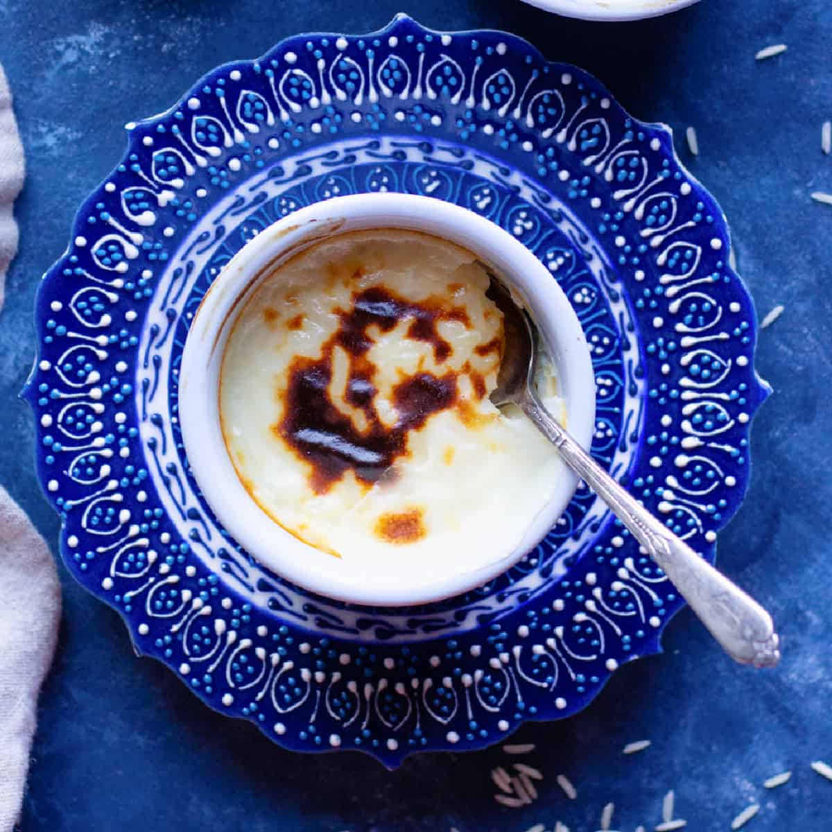 If you love light and creamy desserts, Sutlac, also known as Turkish rice pudding recipe is it. Creamy and rich with a golden top, this baked rice pudding is also gluten-free. Learn how to make this tasty dessert with this tutorial and step-by-step photos. 
