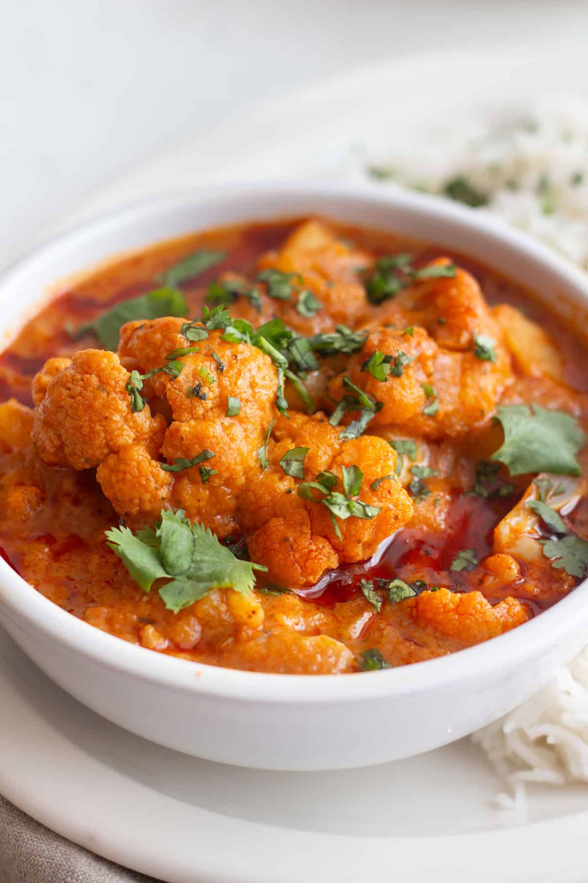 Here's a delicious "clean-the-fridge" vegetable tikka masala recipe that you'll love. Learn how to make a tasty vegetarian tikka masala with just a few ingredients and an easy shortcut. This cauliflower tikka masala is full of flavor and will knock your socks off!&nbsp;