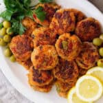 Salmon patties on a platter.