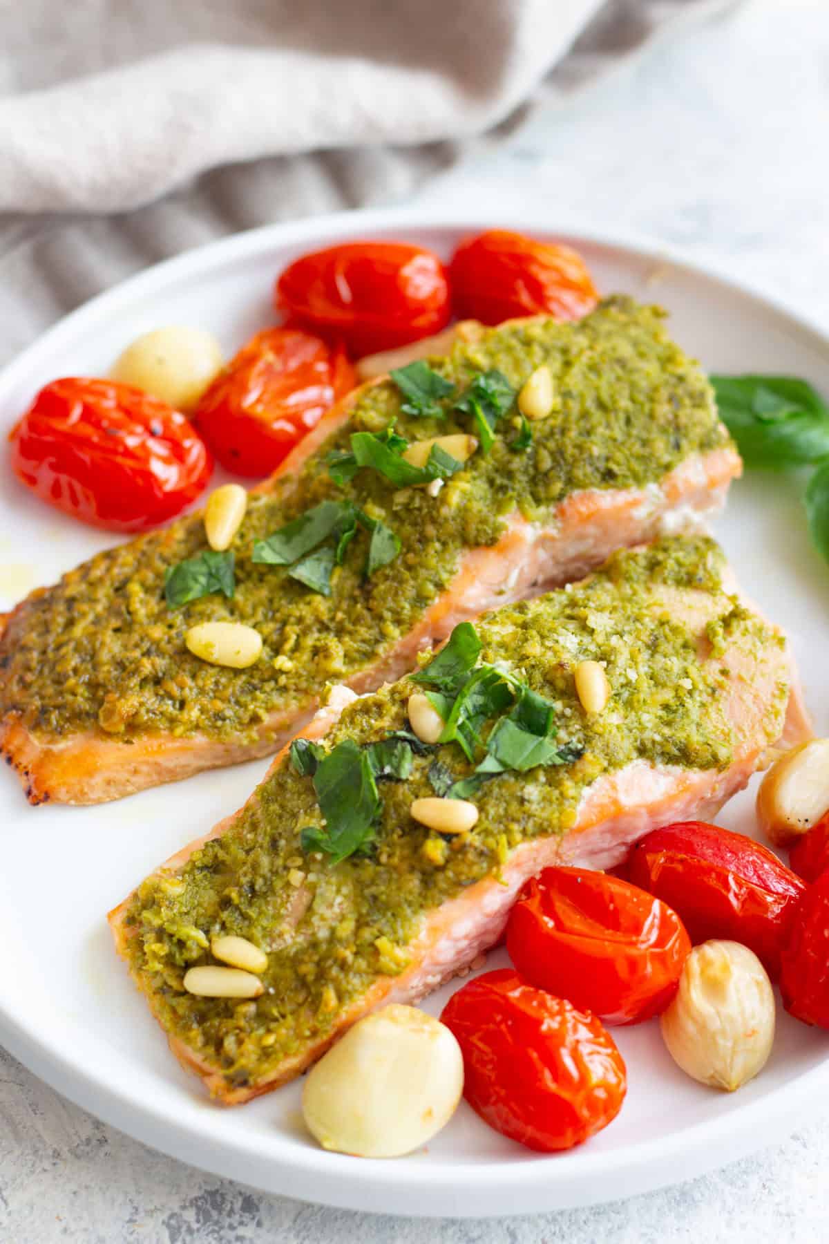 Here is an easy baked pesto salmon recipe that even picky eaters will love! Have dinner on the table within 25 minutes using this simple yet delicious recipe.