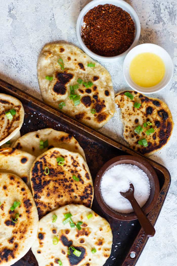 This naan without yeast recipe is made on the stove and is perfect for any new baker. 