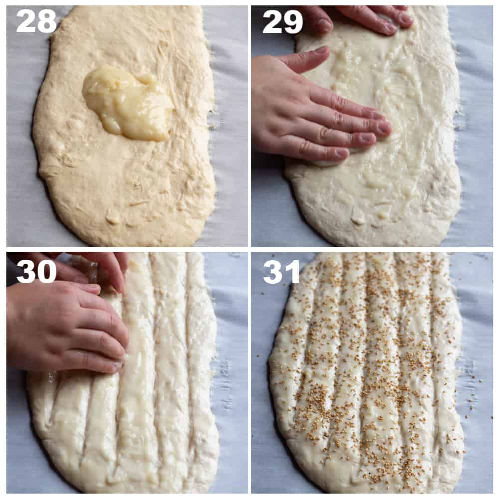 Spread the glaze with your hands, make indentations and top with sesame seeds. 