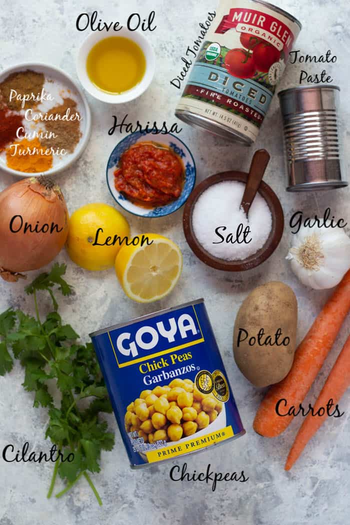 To make this chickpea stew you need onion, garlic, potato, carrot, lemon, spices and tomato paste.