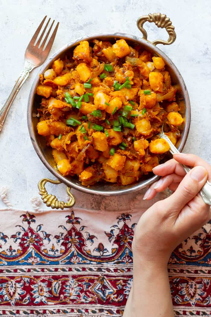 A plate of fried potatoes and onions made Persian style. 