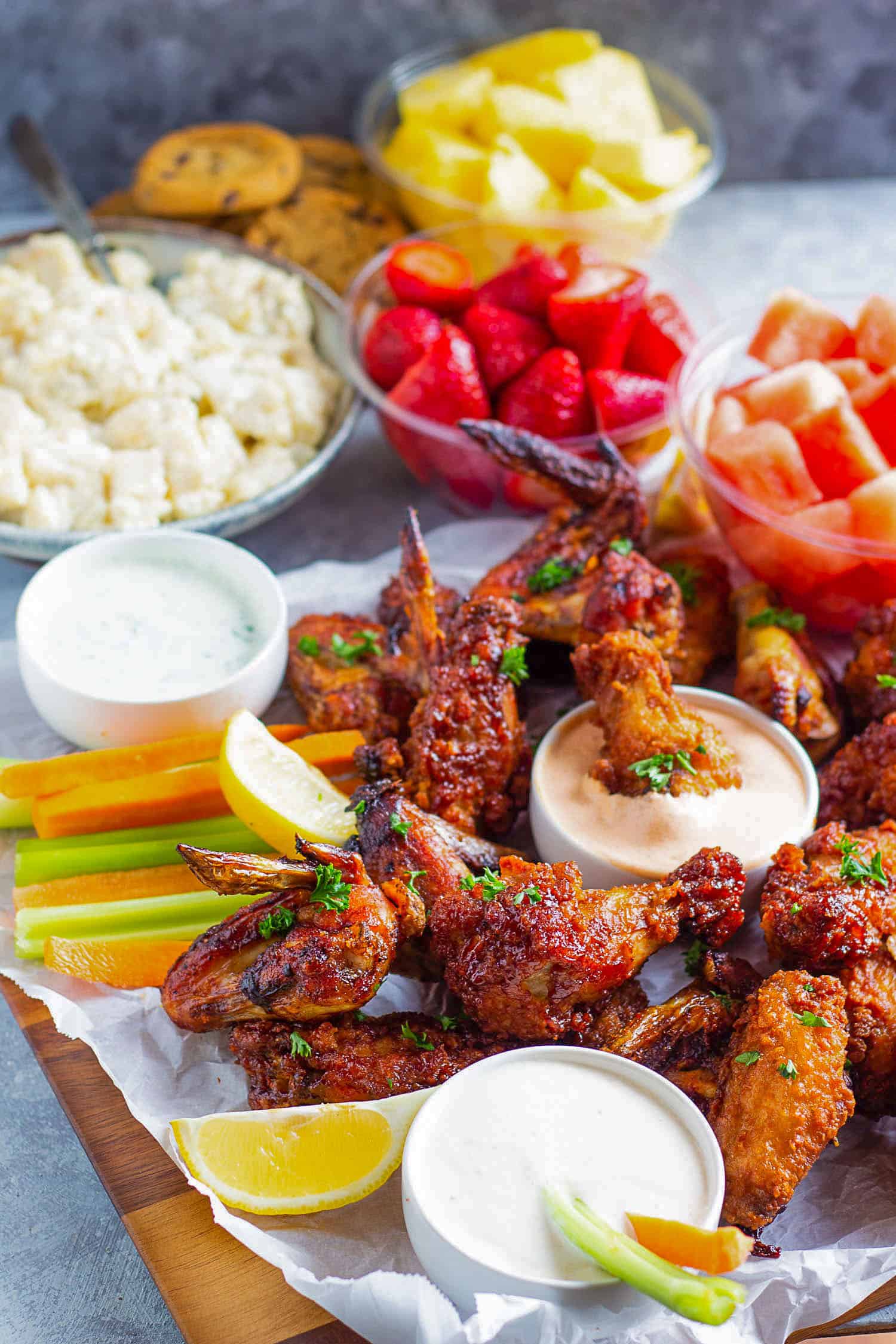 Dip the wings in the smoked paprika aioli dipping sauce. 