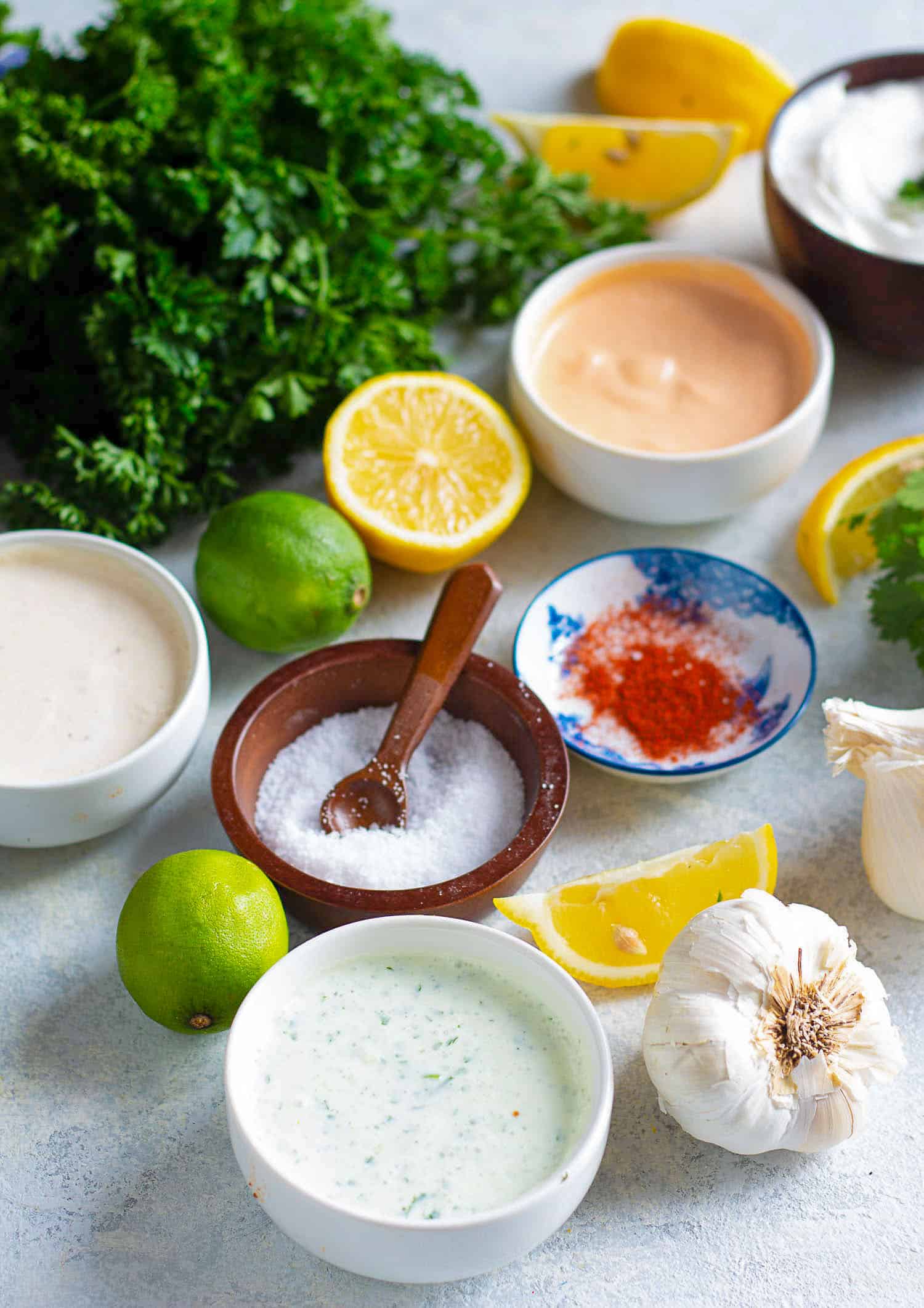 Three dipping sauces for wings. Made from scratch. Smoked paprika aioli, cilantro lemon and garlic parmesan.