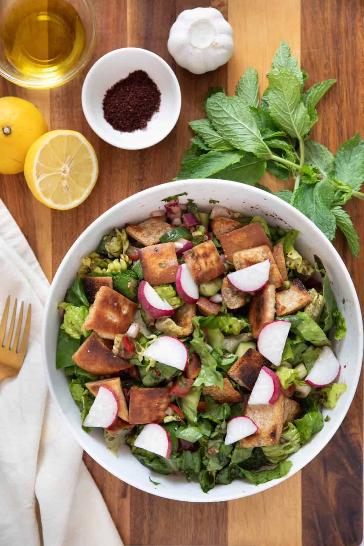 Fattoush is a simple Middle Eastern chopped salad that's perfect for any meal. This Fattoush recipe is easy to follow and uses seasonal fresh ingredients.