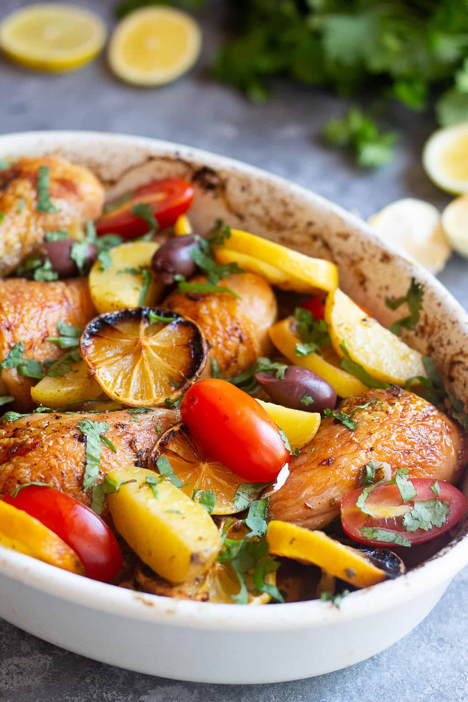 Close-up shot of Greek chicken and potatoes. 