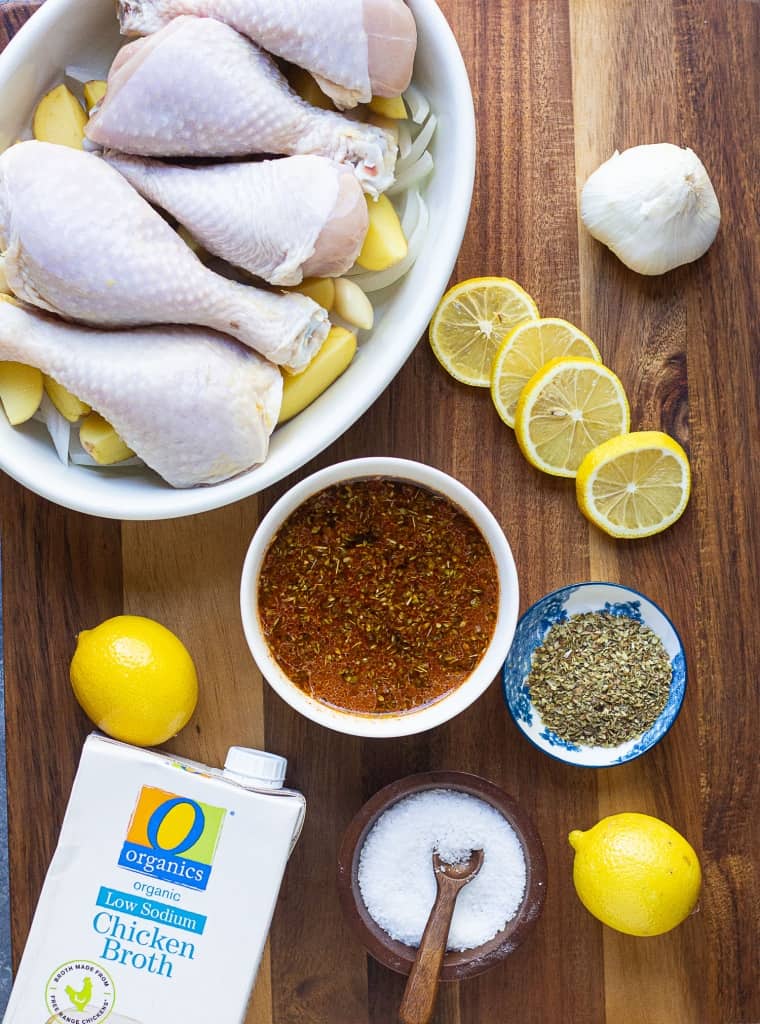 Mix olive oil, lemon juice, broth and spices and pour over the chicken.