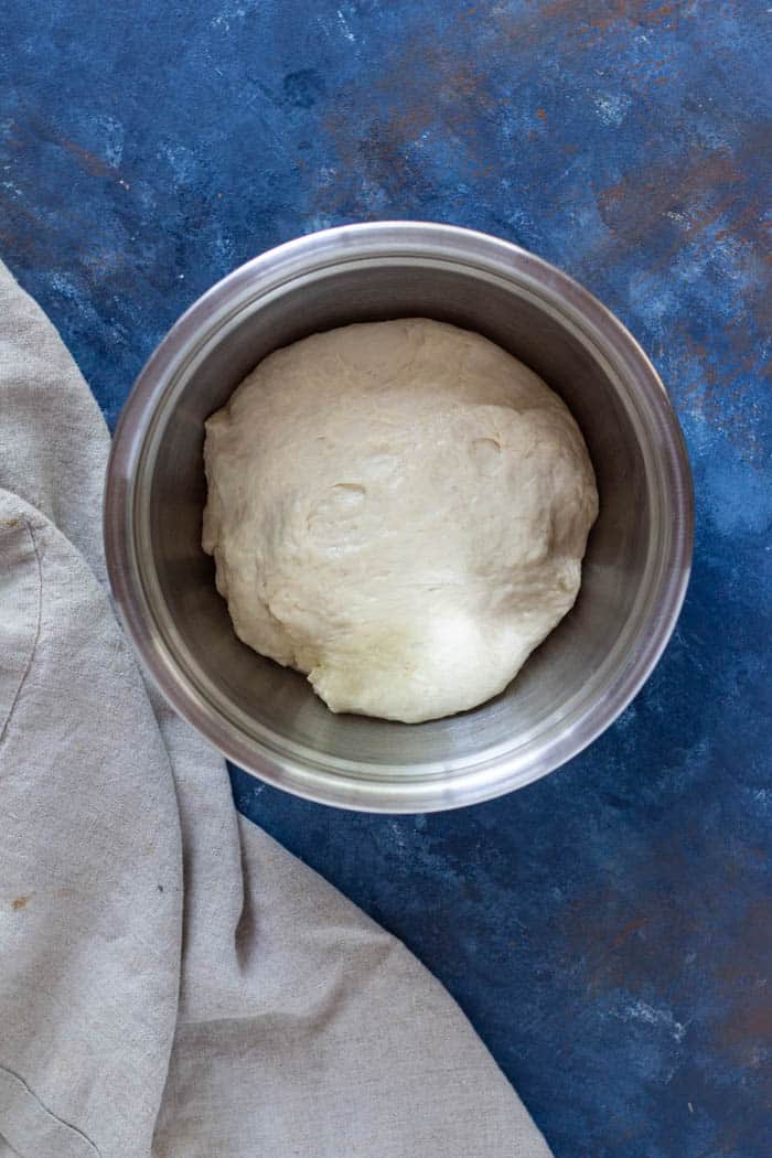 Make the dough and place it in a large bowl. Let it rise for 40 minutes. 