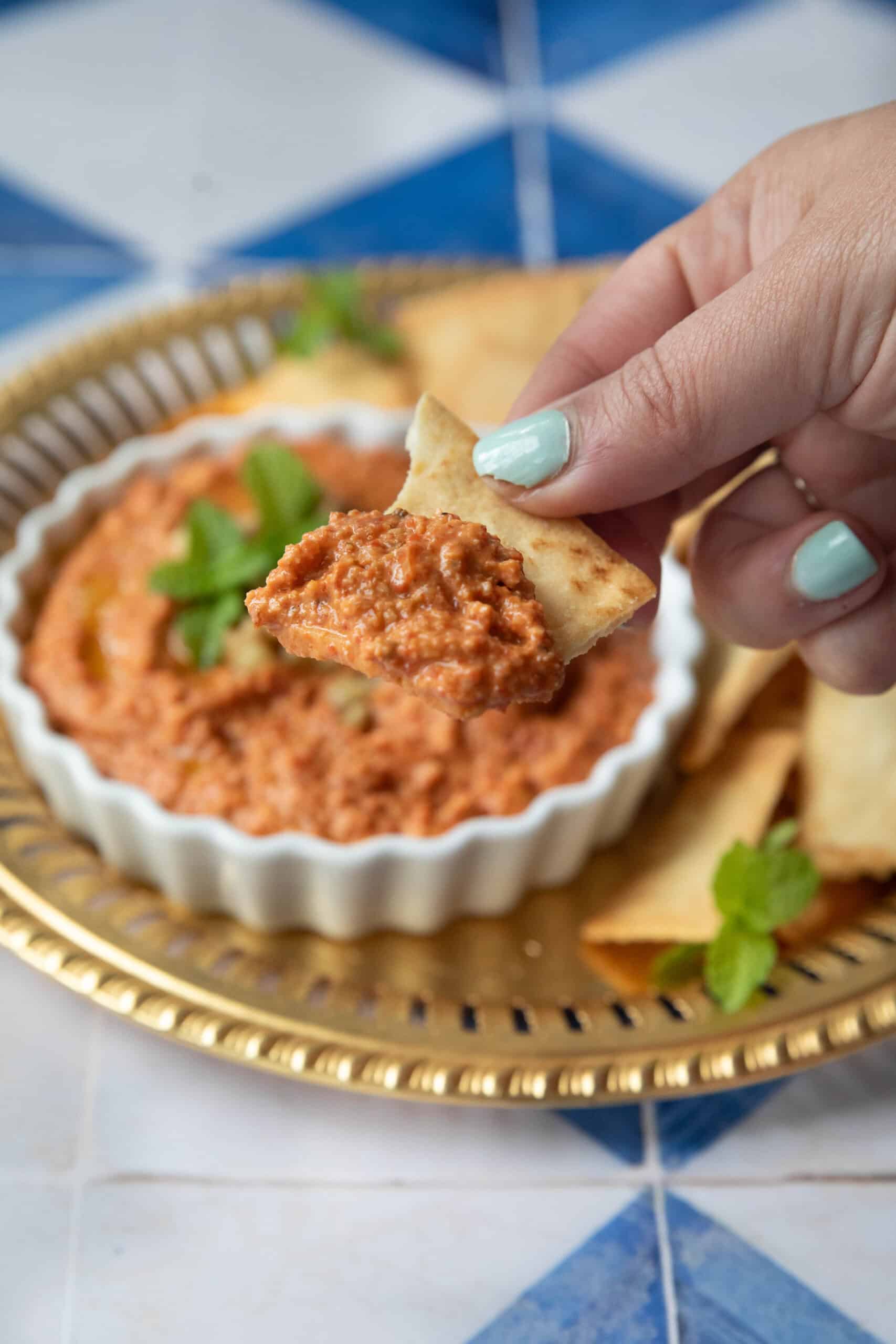 You can serve muhammara with pita crackers, pita chips or fresh pita bread.