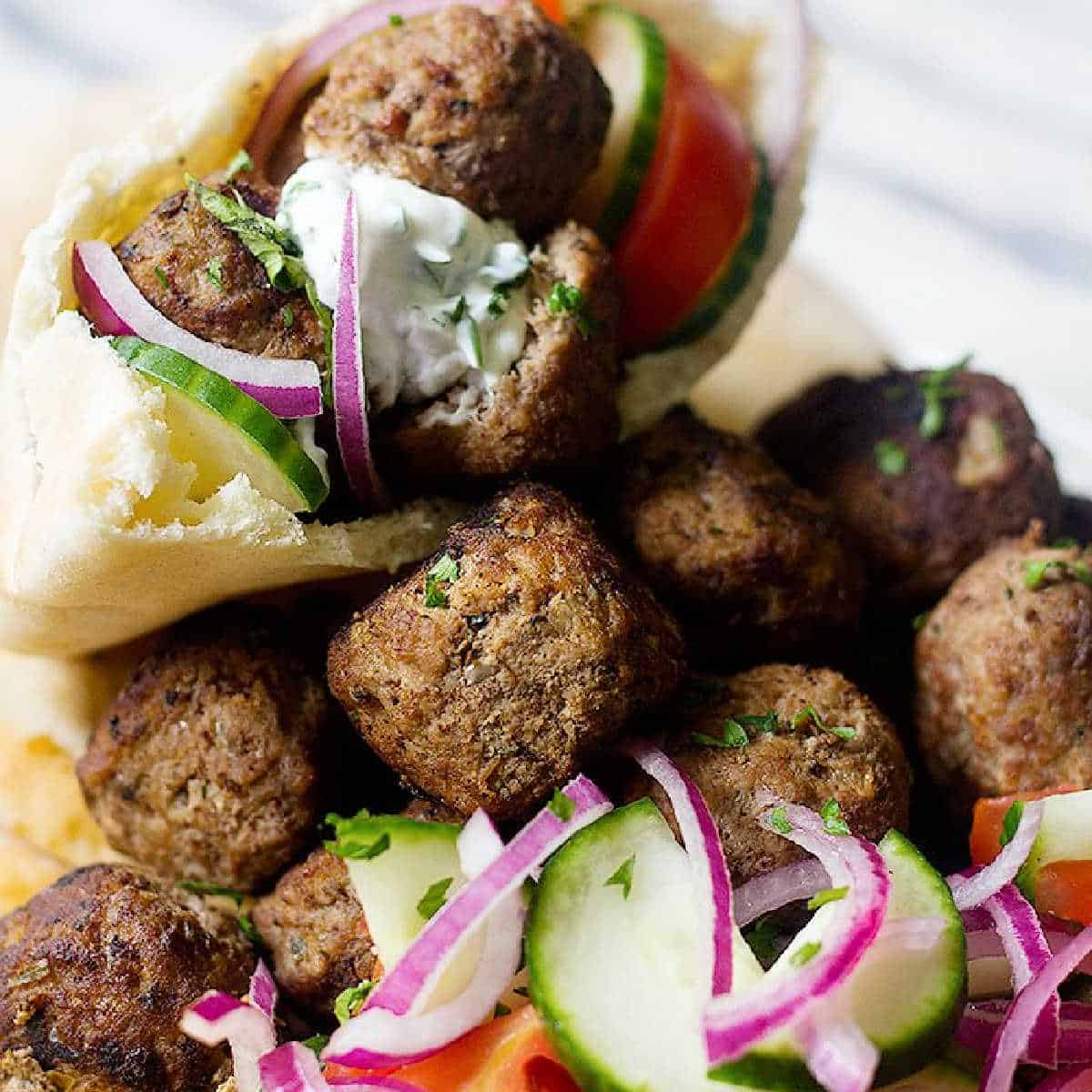 Keftedes are Greek meatballs that are juicy, delicious and easy to make. Serve them with some pita, salad and tzatziki for a complete Mediterranean meal!
