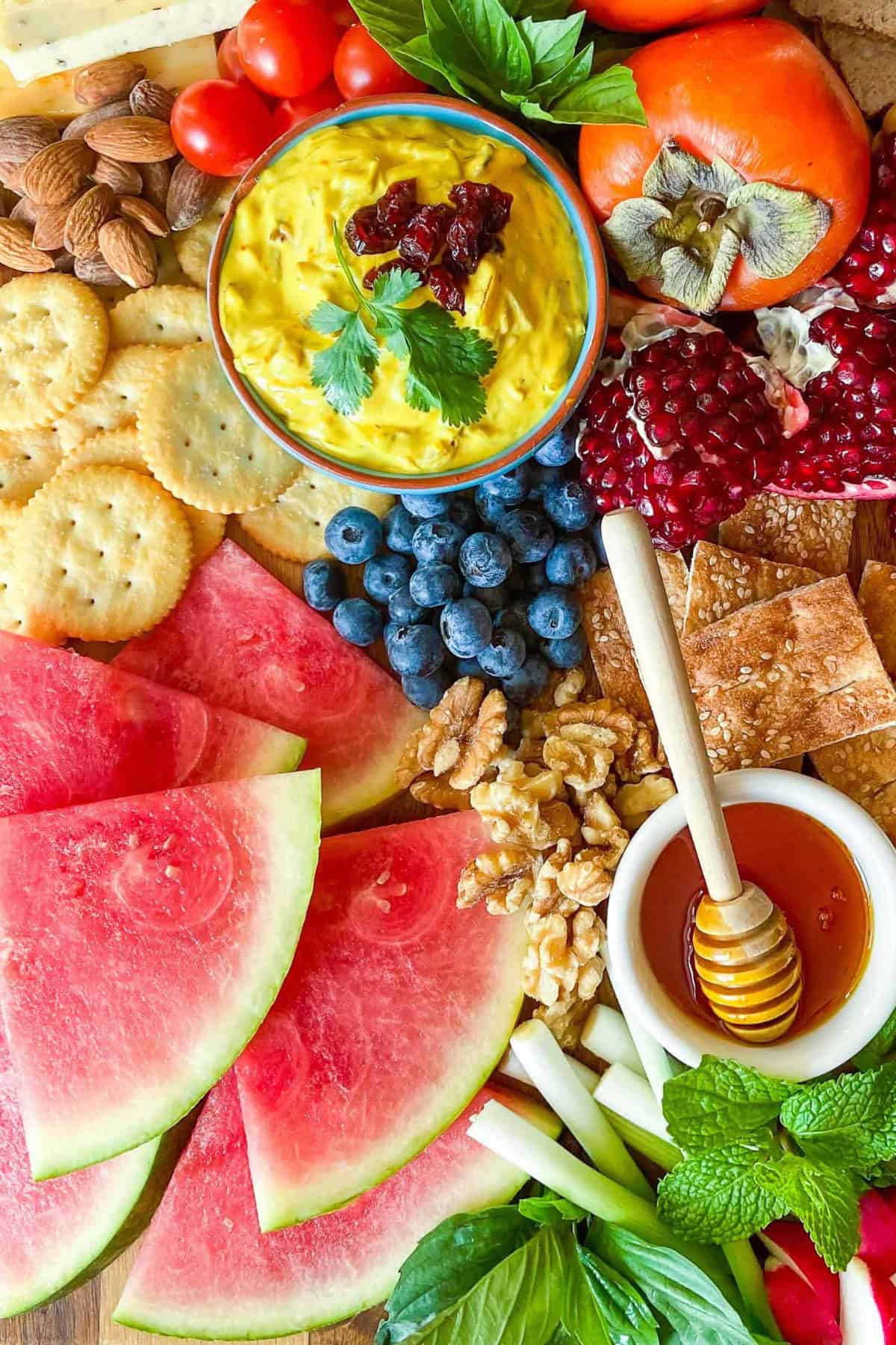 Yalda board with saffron caramelized onion dip