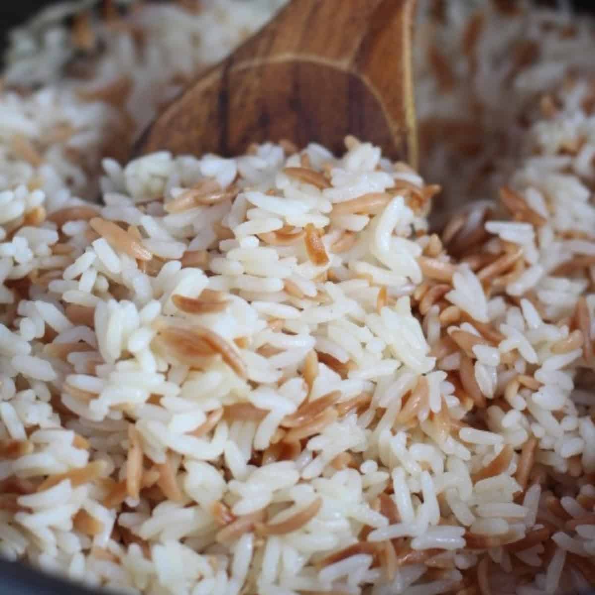 Let the rice sit for 15 minutes before fluffing and serving. 