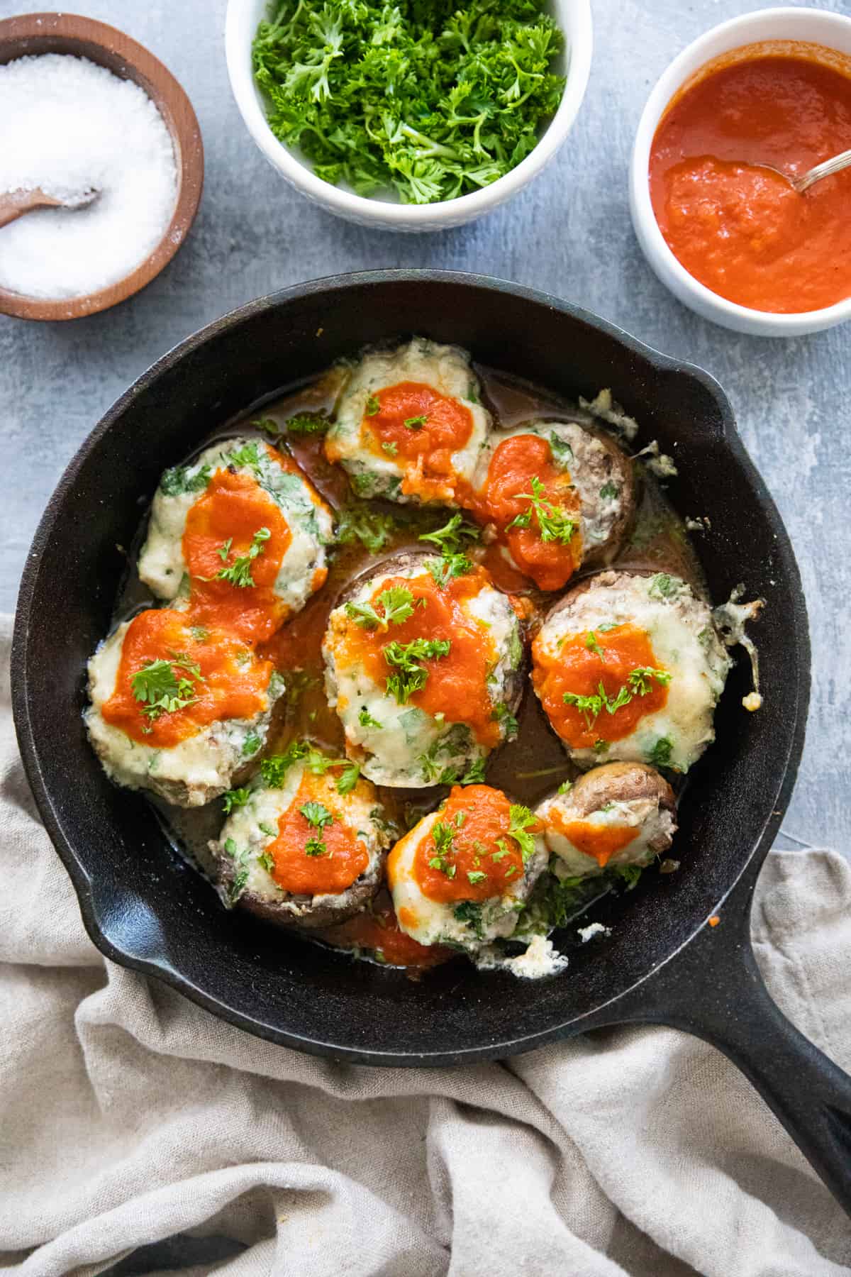 Overhead shot of grilled stuffed mushrooms. 