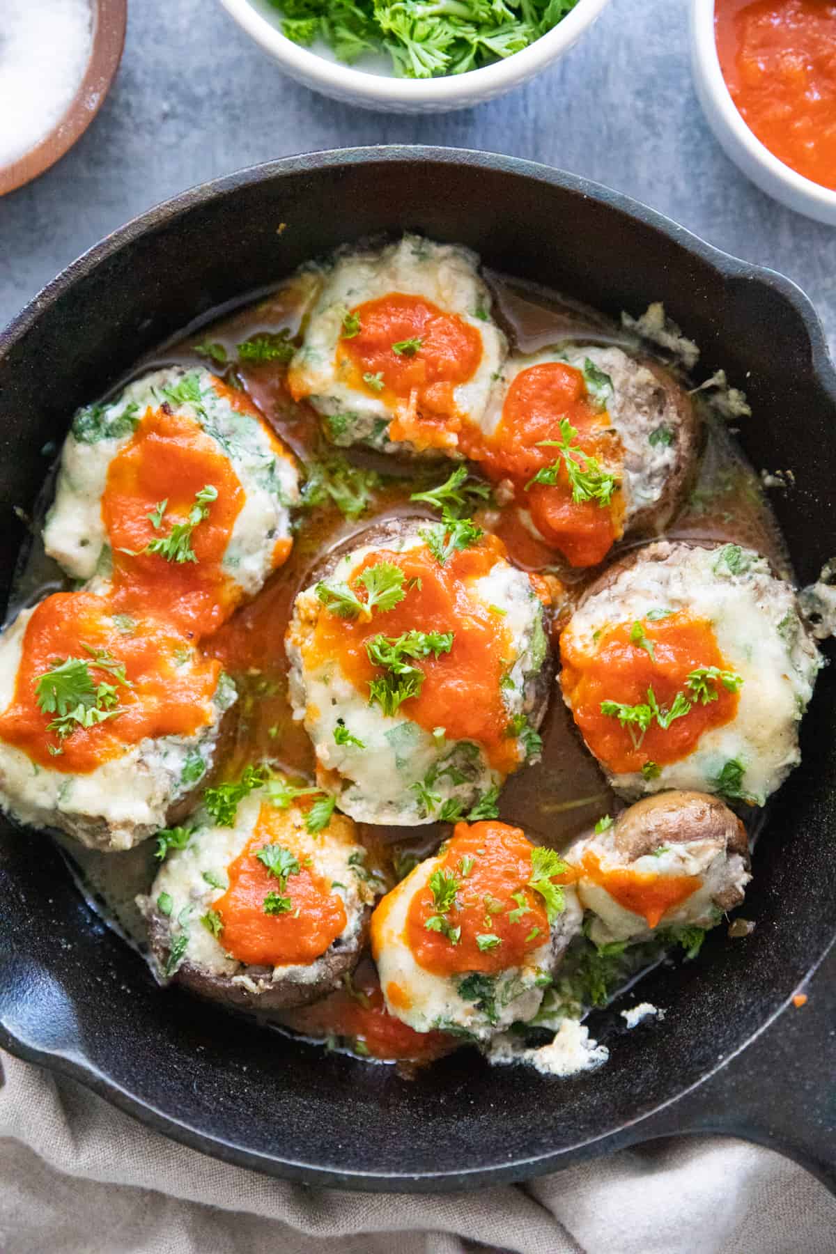 Close up shot of grilled stuffed mushrooms.