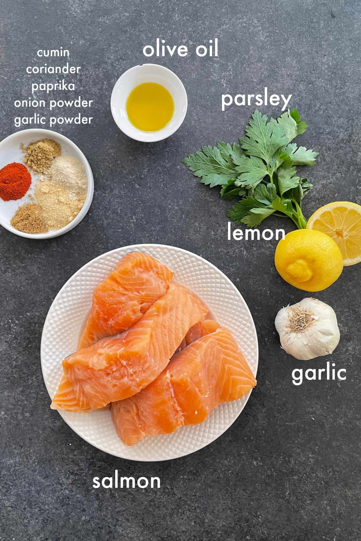 To make this recipe you need salmon, spices, olive oil, garlic, lemon and parsley. 