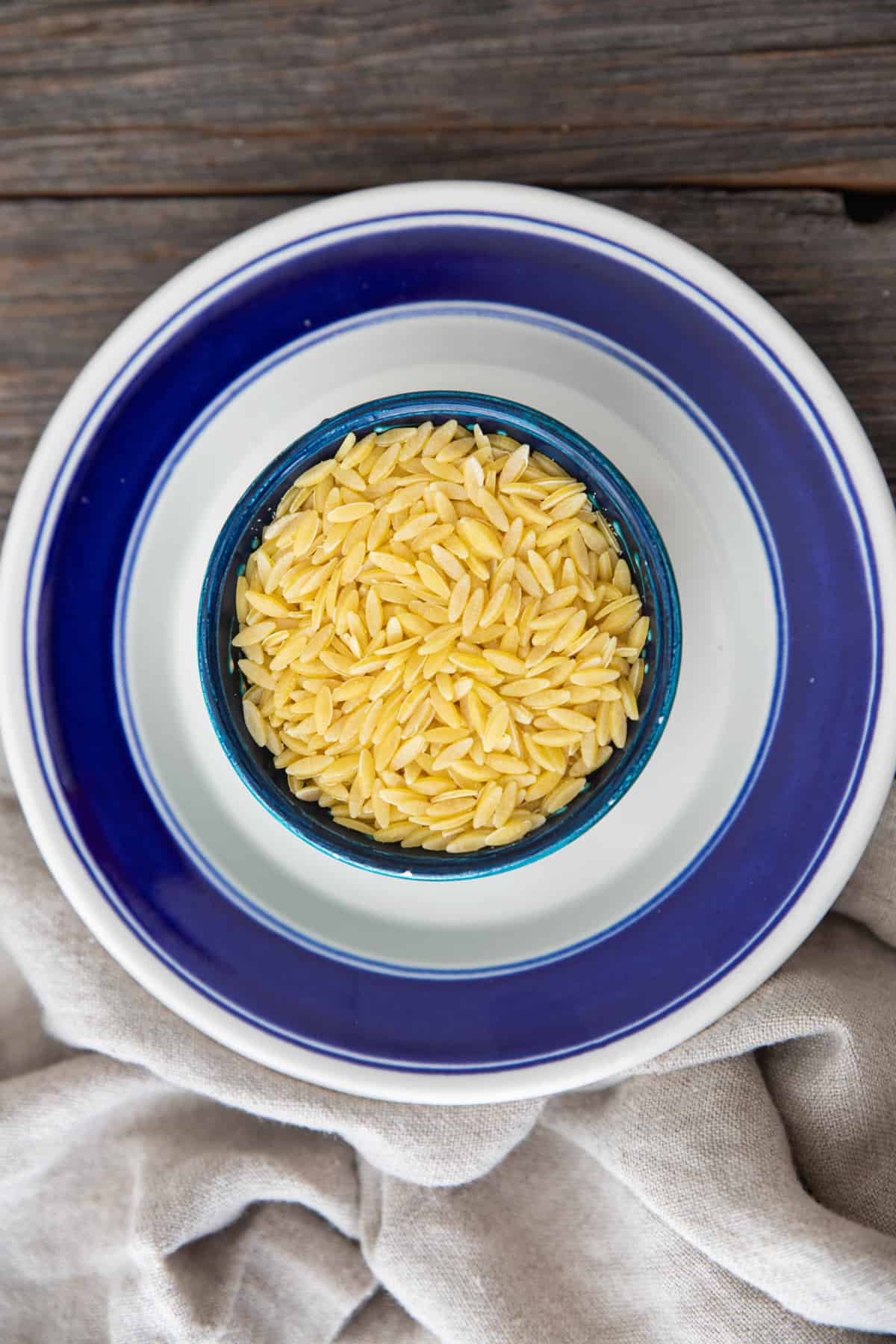 Dry orzo in a bowl. 