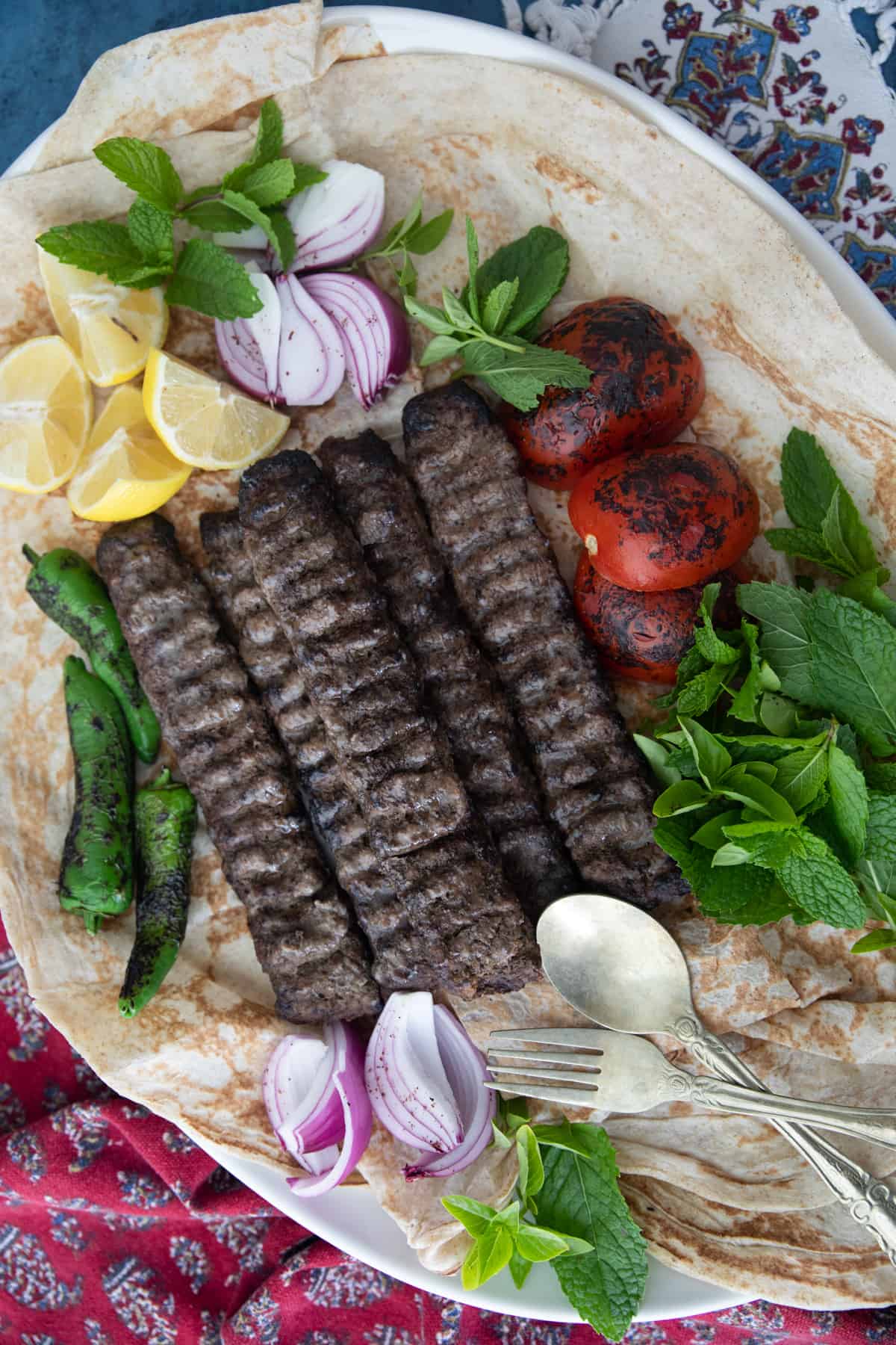Kabob Koobideh is a popular Persian kabob recipe that's so juicy and delicious. Made with minced meat and onion, this kabob recipe is famous for good reason. If you follow my detailed tutorial, you'll learn how to make the perfect koobideh every time.
