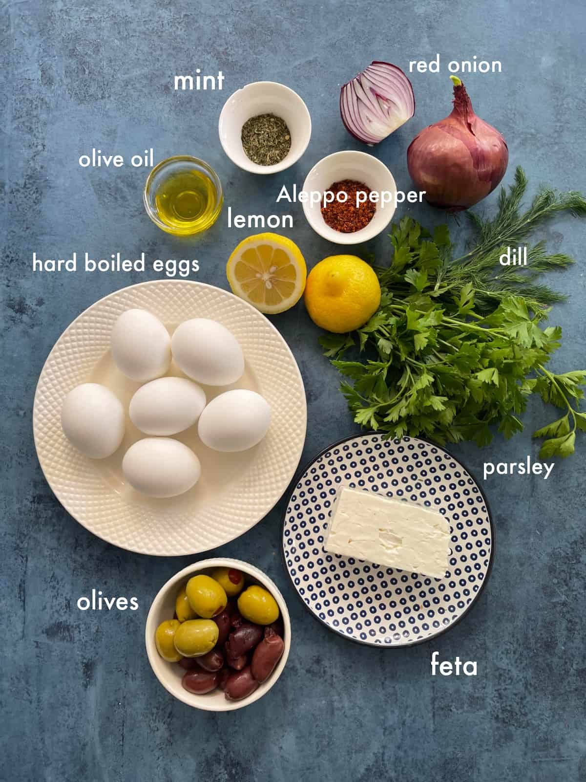 To make this recipe you need eggs, herbs, spices, feta, red onion and olives.