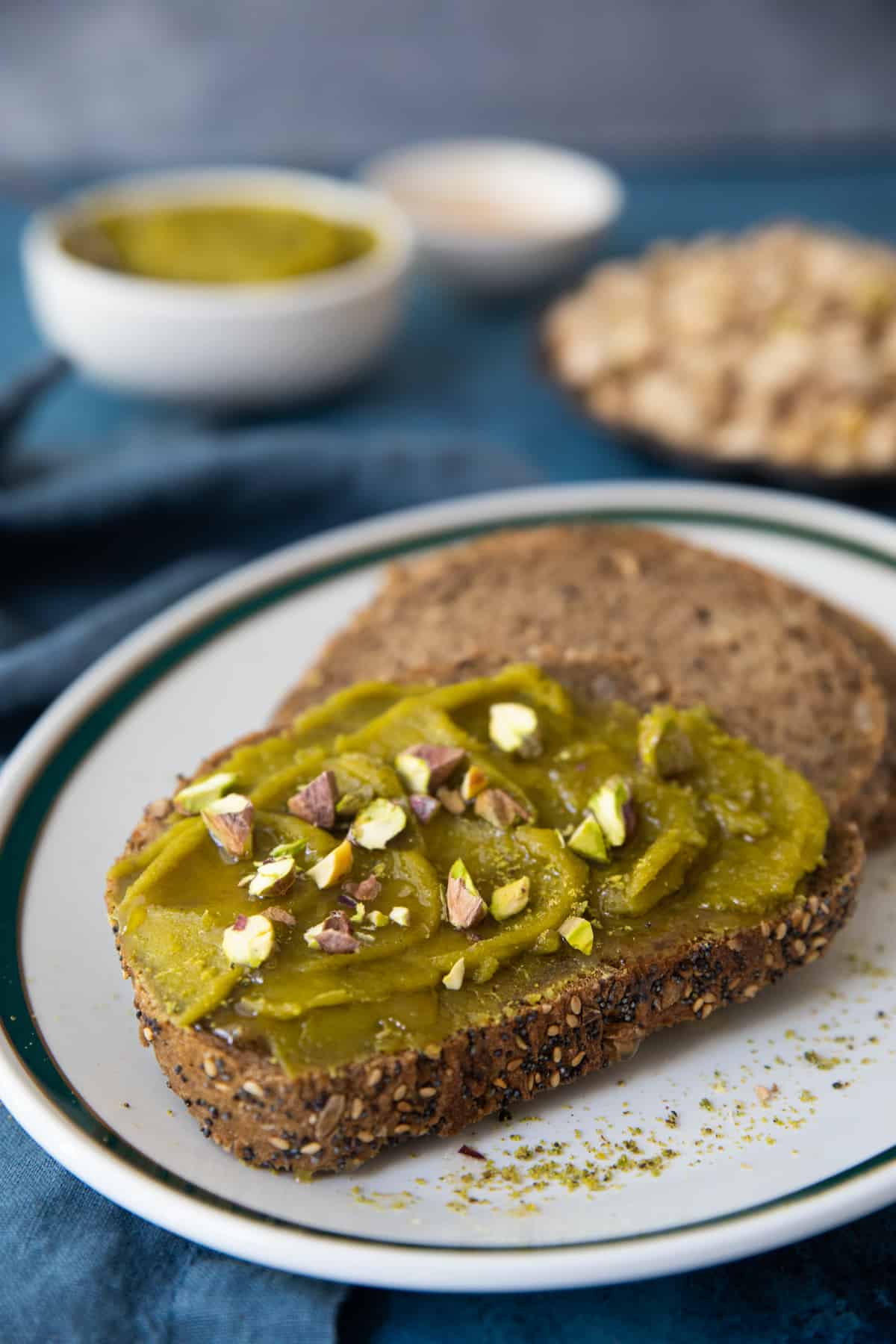 Spread pistachio butter on toasted bread. 