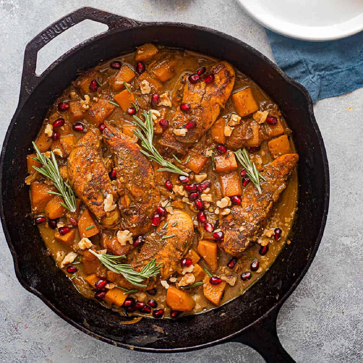 An easy skillet chicken and butternut squash dinner that's ready in 30 minutes. Juicy chicken and butternut squash are flavored with honey, mustard and spices to make a wonderful meal. 
