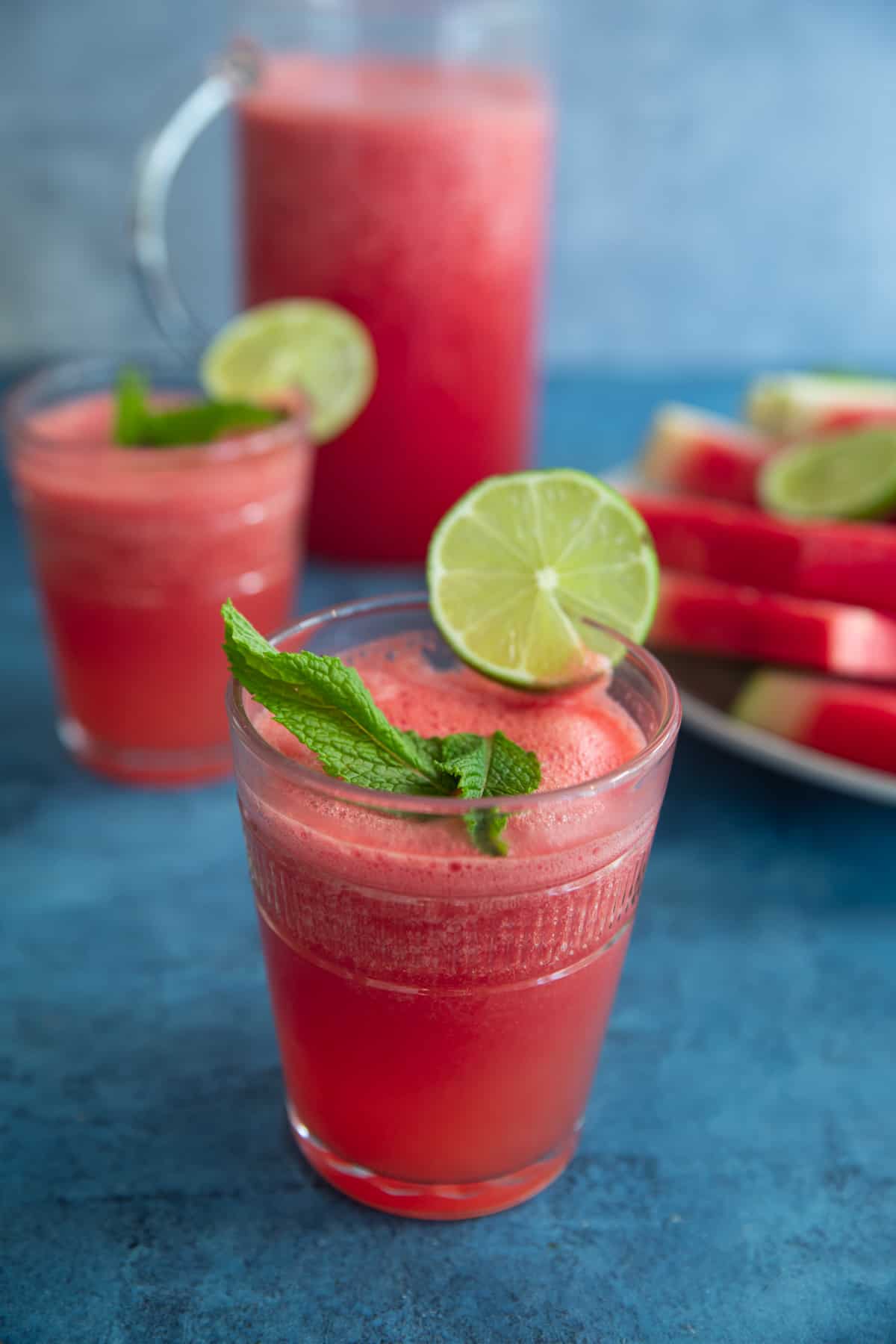 Front shot of watermelon juice with mint and lime. 