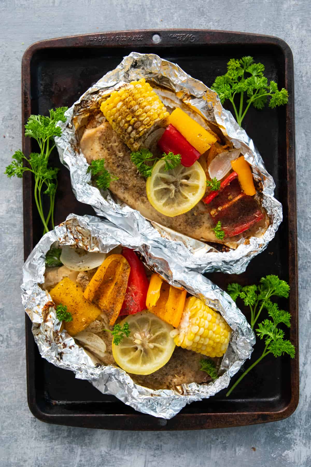 Grilled tilapia in foil.